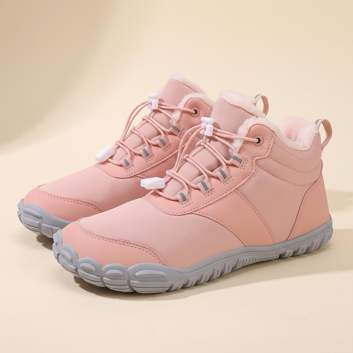 Kastanje winterboot in roze, paar van opzij