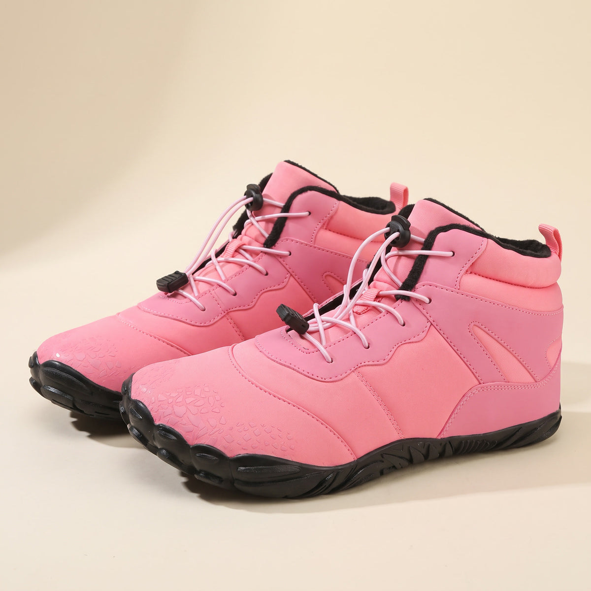 Pluis winterboot in roze, paar van opzij