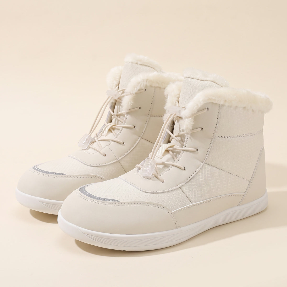 Rijp winterboot in beige, paar van opzij