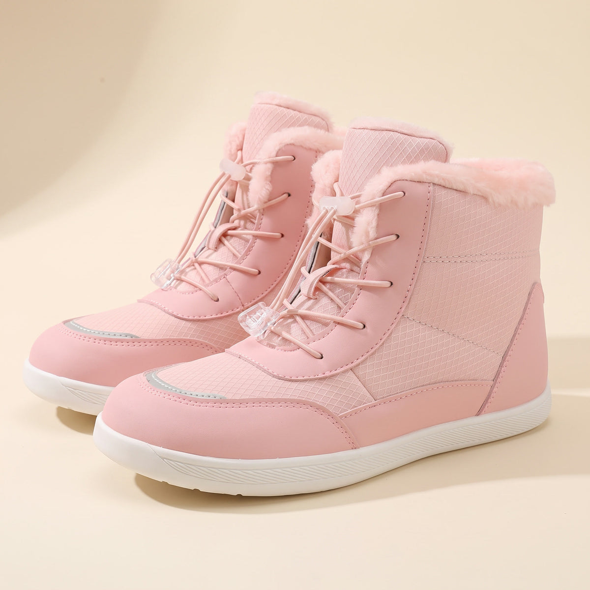 Rijp winterboot in roze, paar van opzij