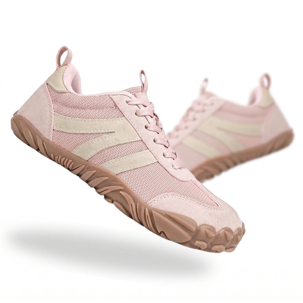 Noor barefoot-sneaker in roze, een paar schuin van opzij