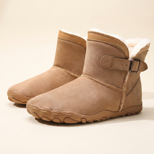 Snug Boot in bruin, zijaanzicht met gesp en bontvoering